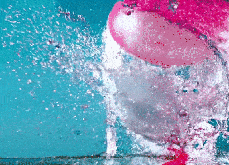 Slow motion clip of a water-filled balloon bursting